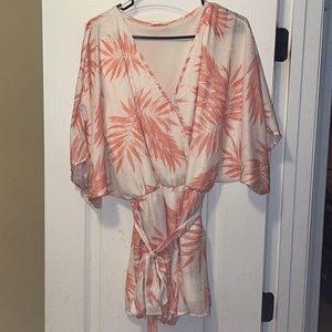 Pink lily romper size Large. Worn once